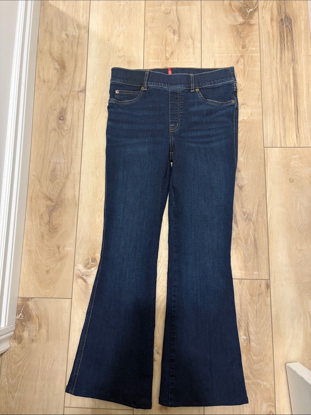 Spanx dark wash pull-on flare jeans.